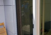 Plisovaná síť na balkónové dveře