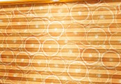 Detail oranžové plisé žaluzie